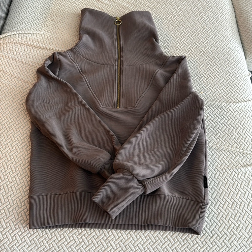 Worn once, beautiful color. Heavy fabric